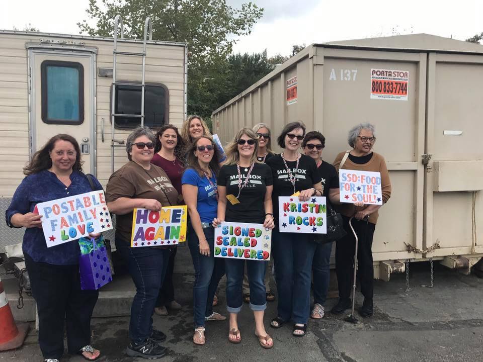 POstables show off their homemade signs before taping Home and Family with Kristin Booth