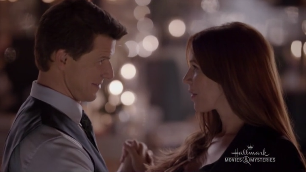Eric Mabius as Oliver O'Toole and Poppy Montgomery as Holly O'Toole in Signed, Sealed, Delivered: From Paris With Love