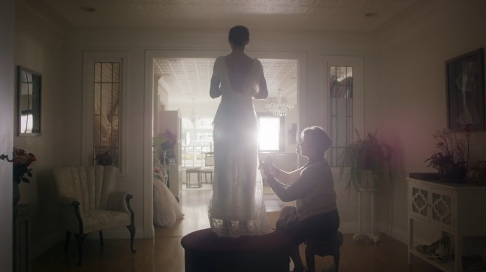 Eveyln Rose alters a wedding dress in Signed, Sealed, Delivered: To The Altar