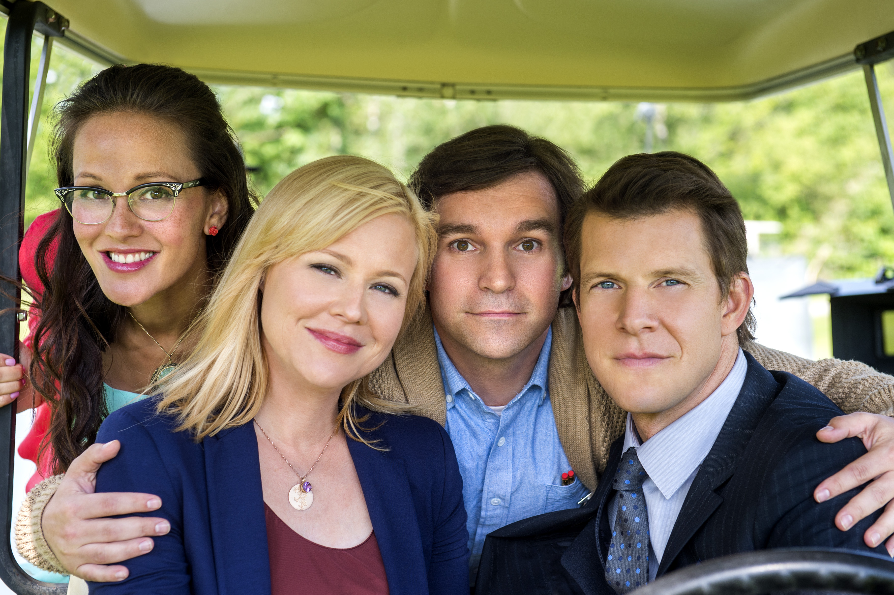 Crystal Lowe as Rita Haywith, Geoff Gustafson as Norman Dorman, Eric Mabius as Oliver O'Toole and Kristin Booth as Shane McInerney in Signed, Sealed, Delivered (2013)