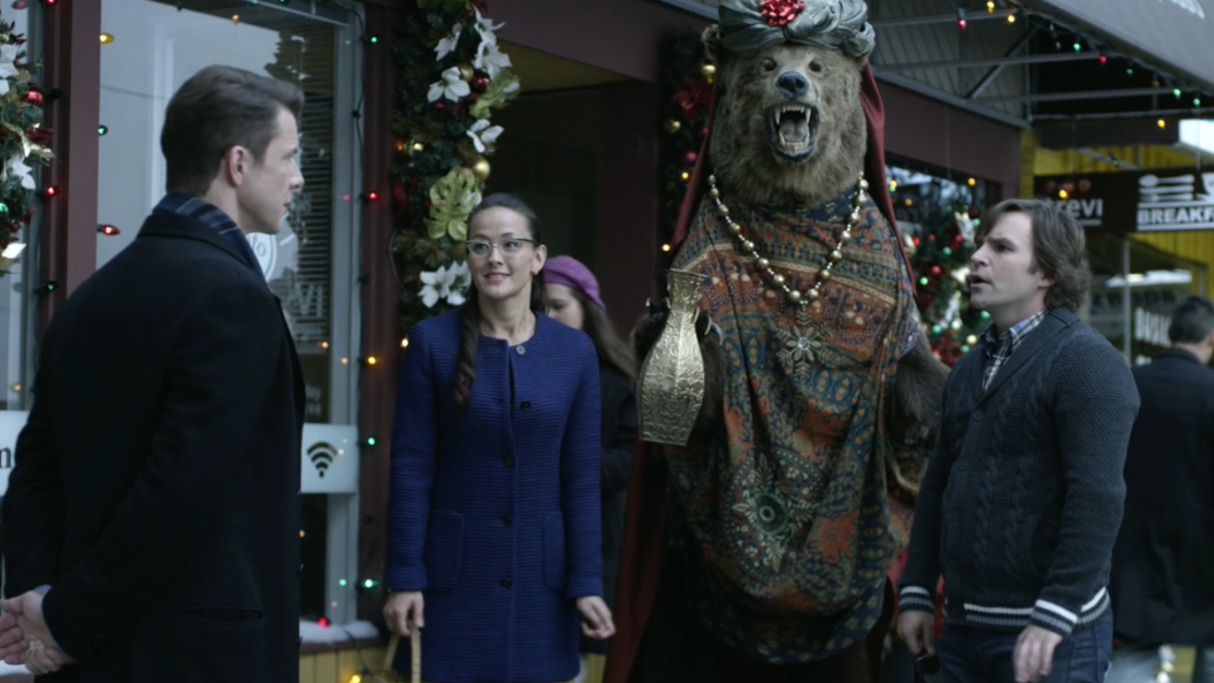 Eric Mabius, Crystal Lowe and Geoff Gustafson in Signed, Sealed, Delivered: For Christmas